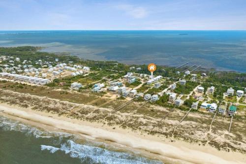 an aerial view of a resort on the beach at Tortuga Tillys in Cape San Blas