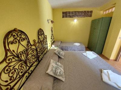 Un ou plusieurs lits dans un hébergement de l'établissement Borgo Gaggi