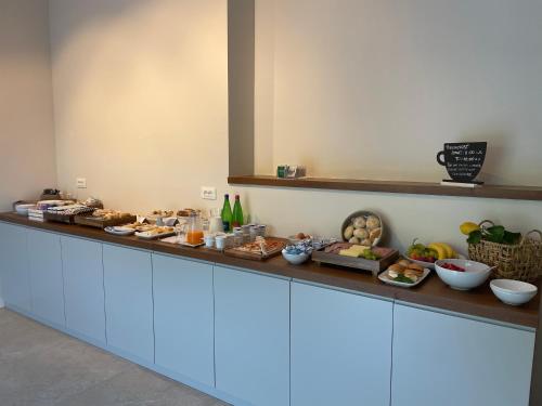 a buffet line with different types of food on it at BLUE BOUTIQUE in Vietri