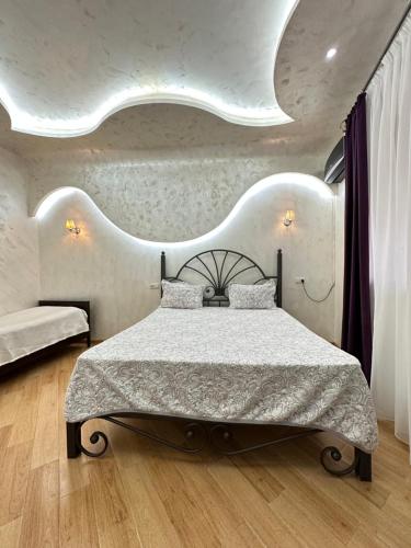 Yerevan Guest House 객실 침대