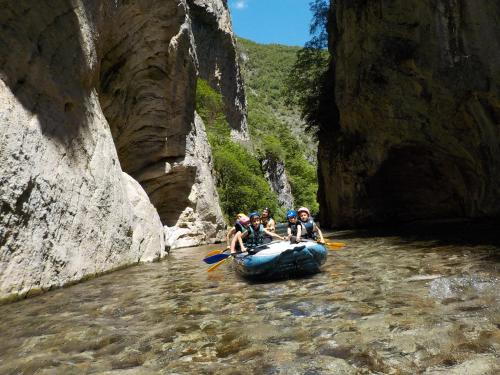 a group of people on a raft in a river at B&B Nonna Rosa in Norcia