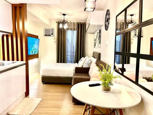 Ένα ή περισσότερα κρεβάτια σε δωμάτιο στο Staycation @ Teffie’s +Netflix & Wifi