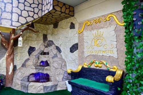 a castle themed room with a bed and a tree at LOCA Suit LİFE AİRPORT HOTEL in Istanbul