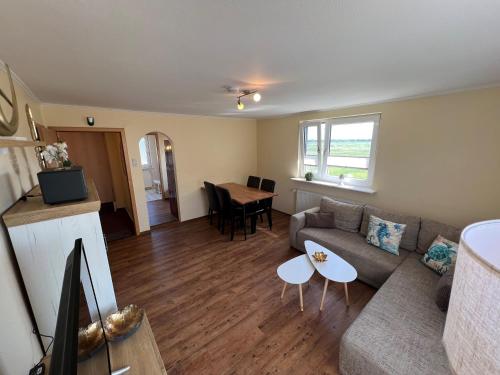 Posezení v ubytování Kugelbake Bantje Wohnung 2