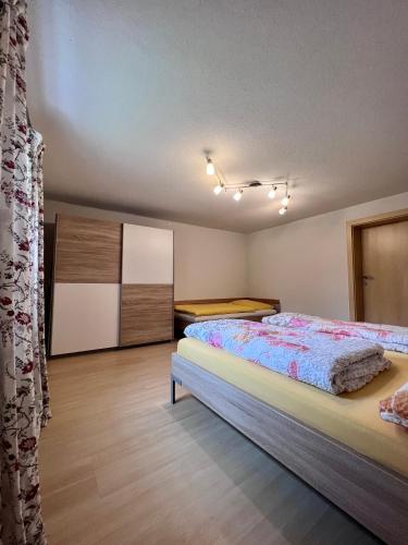 Postel nebo postele na pokoji v ubytování Kiblerhof