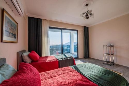 Postel nebo postele na pokoji v ubytování Beyza Villa