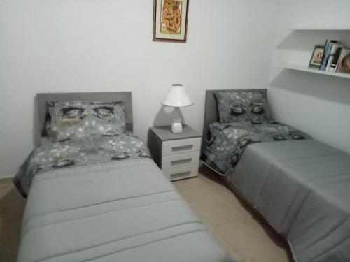 Voodi või voodid majutusasutuse Mont'Isoro toas