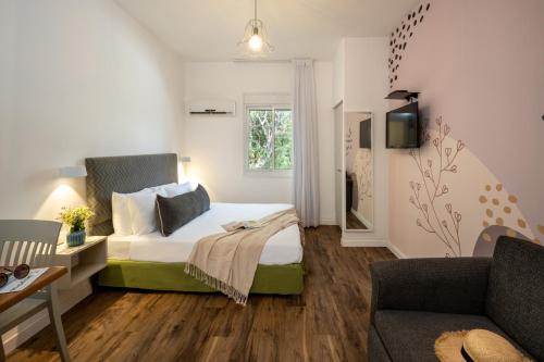 Postel nebo postele na pokoji v ubytování Travel Hotel Eilon