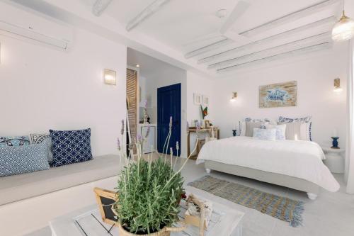 Postel nebo postele na pokoji v ubytování Athina Studios and Suites Plaka