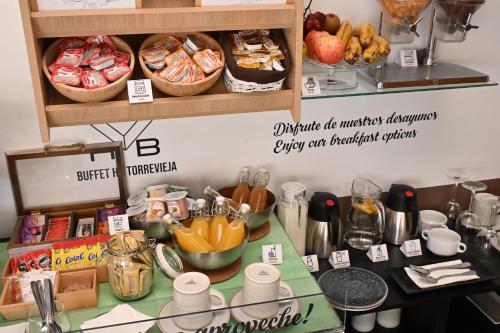 a table with some food on top of it at HB Torrevieja in Torrevieja
