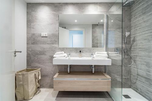a bathroom with a sink and a shower at LME144A Spacious & luxury family home in Estepona
