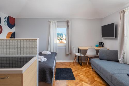 Телевизор и/или развлекательный центр в Solar Beach Inn
