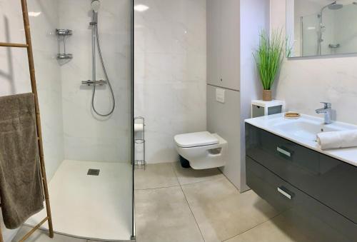 Ванная комната в Appart T3 4 étoiles 4/6 personnes Porto Vecchio