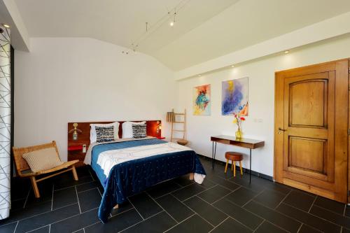 Кровать или кровати в номере Domaine Pozzo di Mastri hôtel & spa