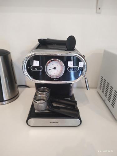 a toaster sitting on top of a counter at Chaloupka která má šmrnc in Čáslav
