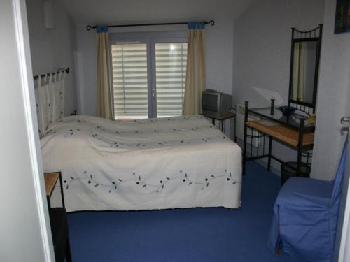 Postel nebo postele na pokoji v ubytování Logis L'Auberge du Quercy Blanc