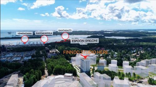 studio Finnoo Espoo next to metro, easy to reach Helsinki and Otaniemi, Aalto في إسبو: اطلالة جوية على مدينة بها لافتات على الشارع