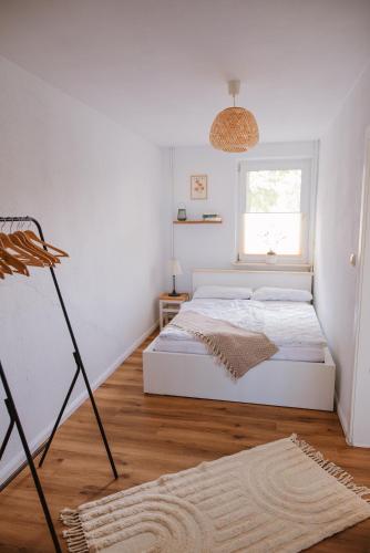 Katil atau katil-katil dalam bilik di Ferienwohnung Nr 4 Boddenblick Kanu Natur Rügen