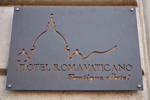 a sign for the hotel romannavianabah at Hotel Roma Vaticano in Rome