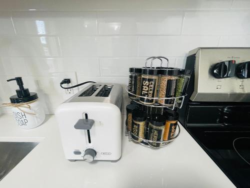 a kitchen counter with a white sewing machine at Retreat near Kaseya Center Calle Ocho Downtown Miami Beaches in Miami