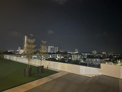 a view of a city at night from a rooftop at The Ambiance, Melaka in Melaka
