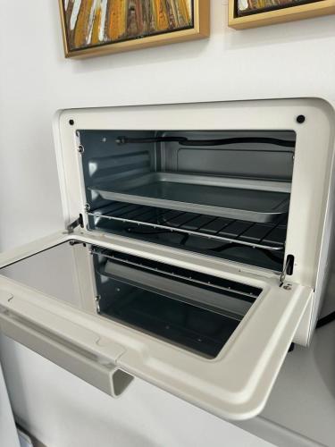 an open door of an oven on a wall at The Ambiance, Melaka in Melaka