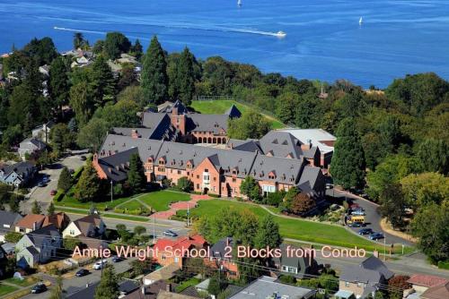 an aerial view of a large house on a hill at Water View, Best Area, 2 Bedrooms, WD, Jacuzzi Bath, New Carpet, Balcony, View, 825sf in Tacoma