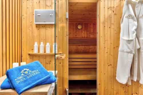a sauna with a blue towel on a wooden wall at Villa Soul Sisters in Korčula