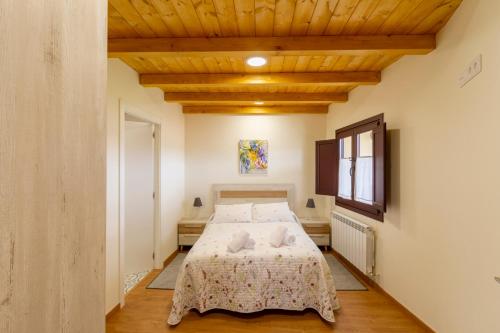Ένα ή περισσότερα κρεβάτια σε δωμάτιο στο Casa Añolo