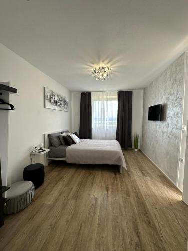 Ένα ή περισσότερα κρεβάτια σε δωμάτιο στο Apartmaji Meli Pu