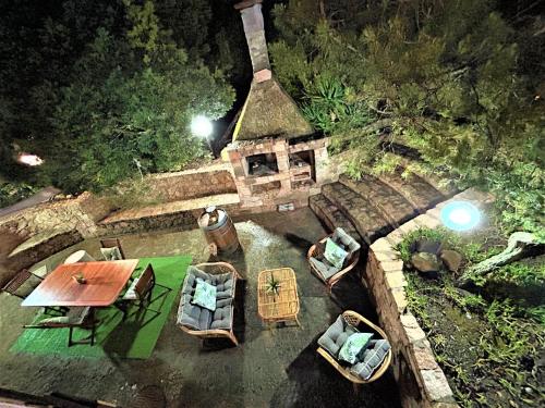 an overhead view of a table and boats in the water at Sardinian Seaside Retreats in Badesi