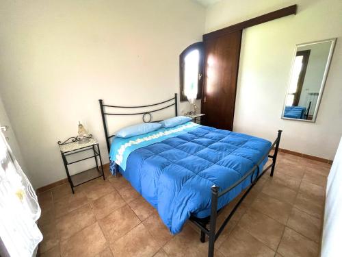 Ένα ή περισσότερα κρεβάτια σε δωμάτιο στο Agriturismo Paradiso