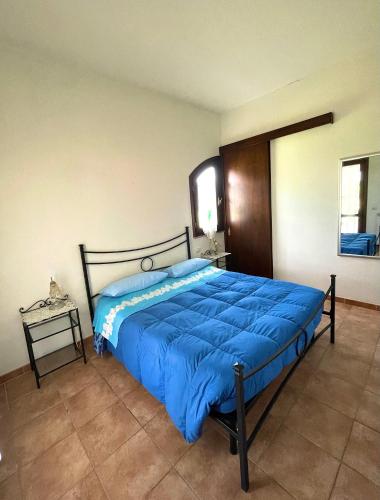 Ένα ή περισσότερα κρεβάτια σε δωμάτιο στο Agriturismo Paradiso