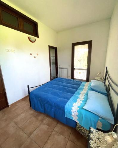Ένα ή περισσότερα κρεβάτια σε δωμάτιο στο Agriturismo Paradiso
