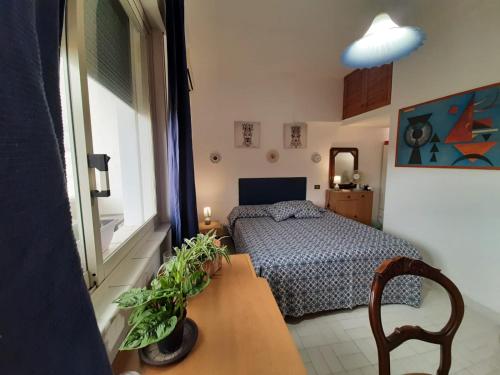 Łóżko lub łóżka w pokoju w obiekcie Casa Marisa