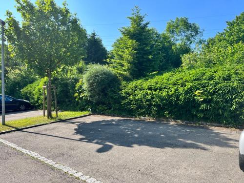 a car parked in a parking lot at Panorama Domizil Ravensburg mit Alpenblick Balkon in Ravensburg