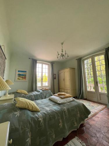 Postel nebo postele na pokoji v ubytování Clos de la Gipiere