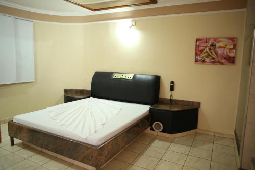 Medieval Motel e Hospedagemにあるベッド