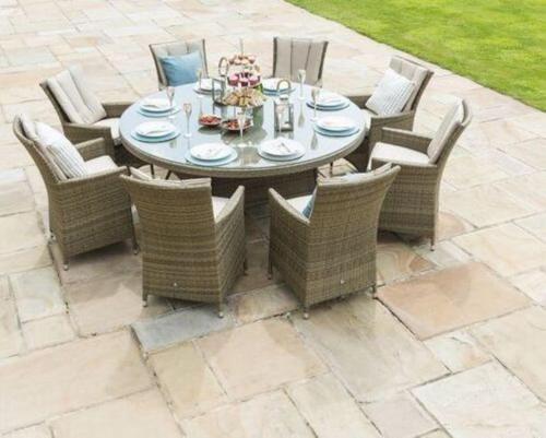 a patio table and chairs with a table and chairs at Farmhouse Villa with Large Pool and Garden in Gozo in Għarb