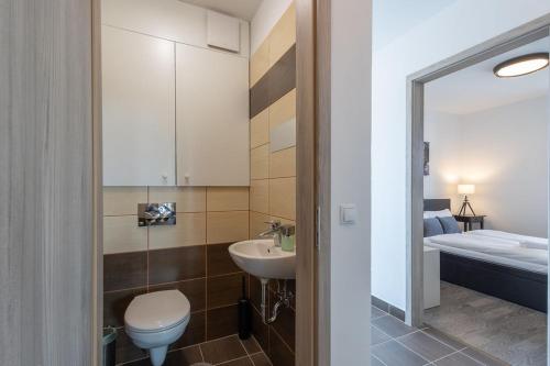 Kúpeľňa v ubytovaní LelleResort BLTN Apartmanok By BLTN