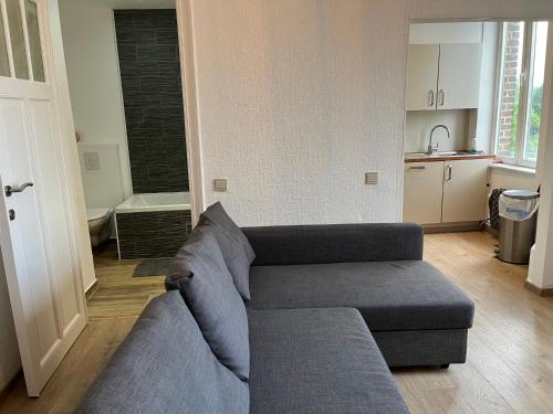 Posezení v ubytování Uccle Chic Flat