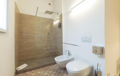 a bathroom with a shower and a toilet and a sink at Soul of Trento Vicolo del vo' in Trento