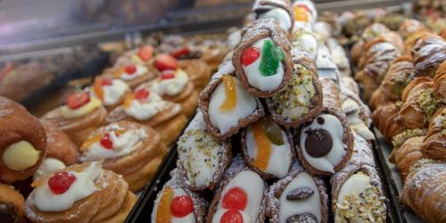 a display case of pastries in a bakery at Casa Giada sul mare in Torrenova