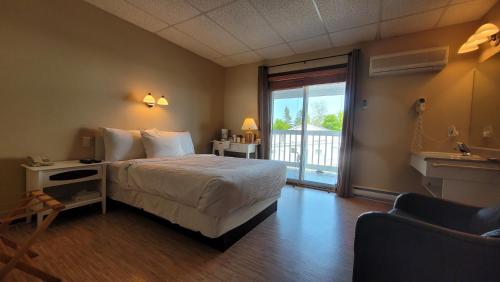 Postel nebo postele na pokoji v ubytování Hôtel Aquamer