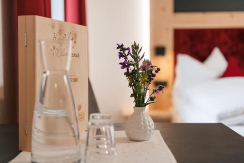 Uma cama ou camas num quarto em Edenhauserhof