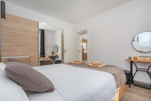 Katil atau katil-katil dalam bilik di Apartment Holiday home DoMa, Čilipi near Dubrovnik