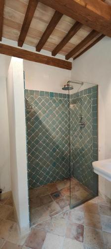 a bathroom with a shower with a glass door at Infinity pool villa - Fonte Piccola in Città di Castello