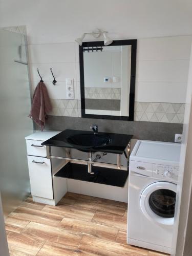 Kuchyň nebo kuchyňský kout v ubytování Apartmány Chmelničky