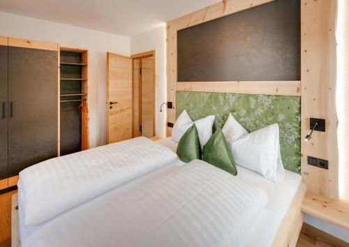 Uma cama ou camas num quarto em Edenhauserhof