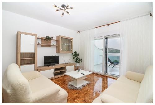 TV a/nebo společenská místnost v ubytování Apartment Legend
